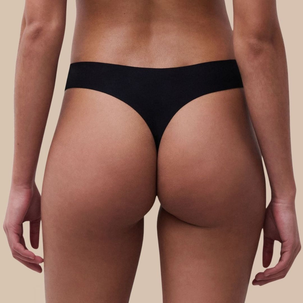 Le String · Anti-pertes blanches