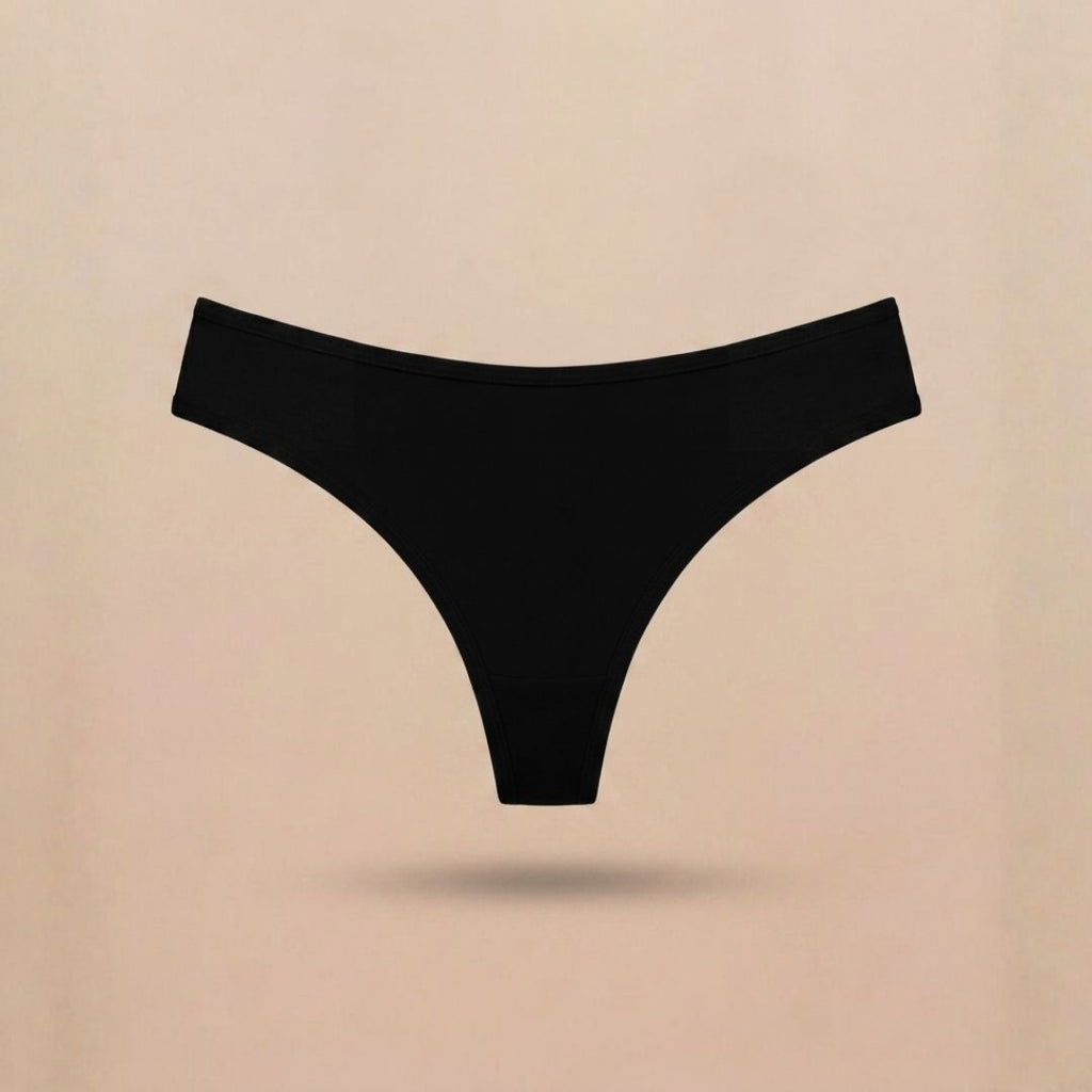 Le String · Anti-pertes blanches