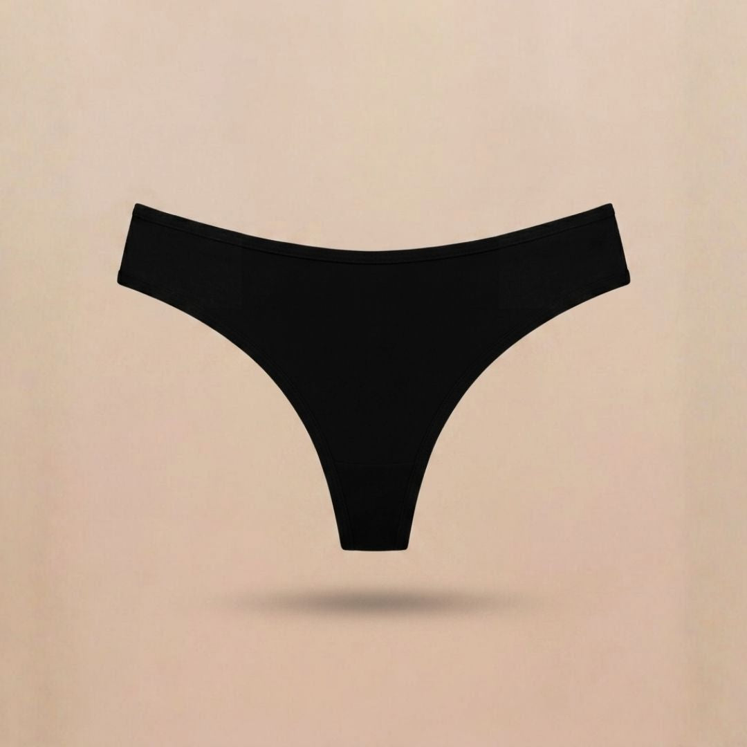 Le String · Anti-pertes blanches